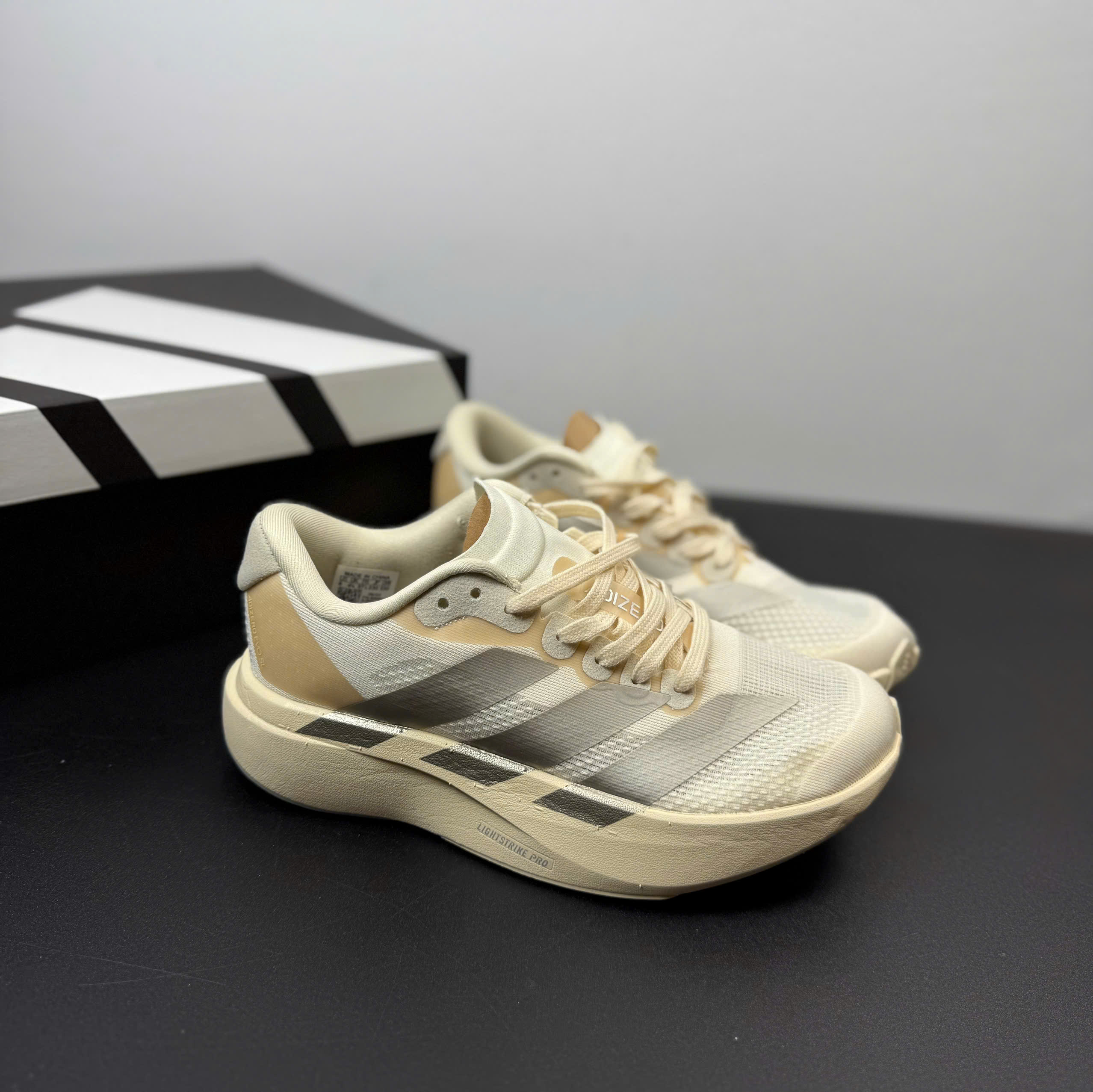 adizero evo kem xám