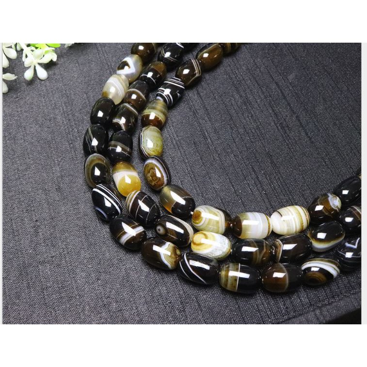 1 viên lu thống thiên nhiên 10x14mm màu Nâu vân sọc