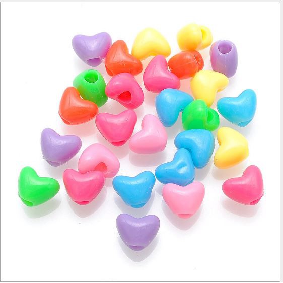(P117-66) gói 10-50gam hạt trái tim 9x11mm, lỗ xỏ 4mm