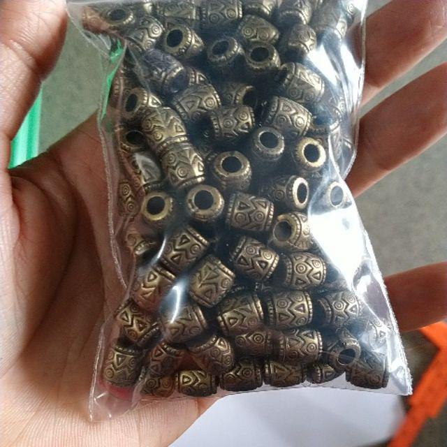 10-50gam charm nhựa hình ống hoa văn màu đồng cổ 8x9mm