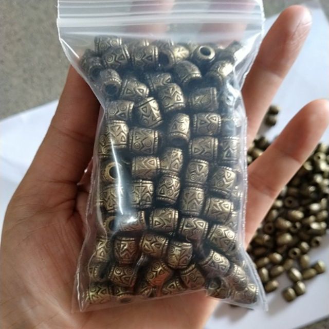 10-50gam charm nhựa hình ống hoa văn màu đồng cổ 8x9mm