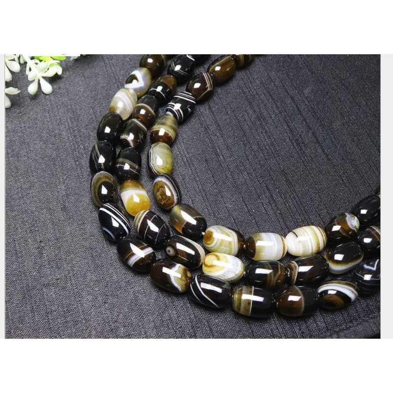 1 viên lu thống thiên nhiên 10x14mm màu Nâu vân sọc