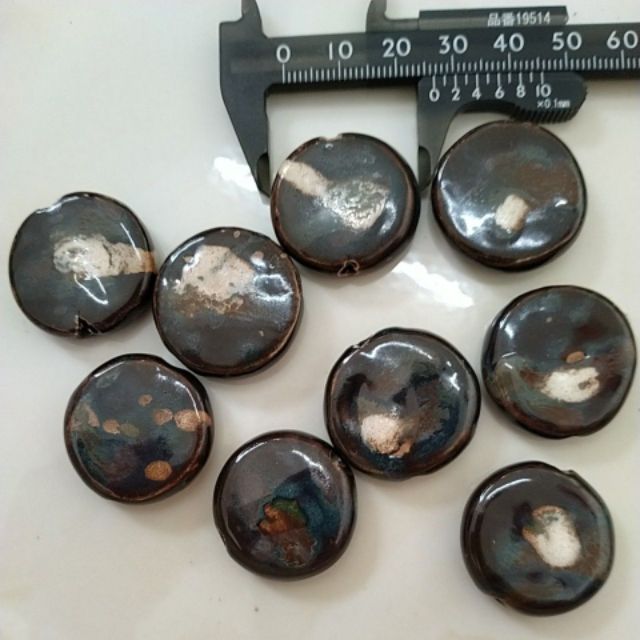 2 viên gốm sứ tròn dẹp hoa văn 27mm