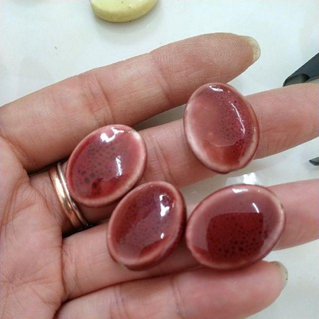2viên gốm sứ oval dẹp 16x22mn