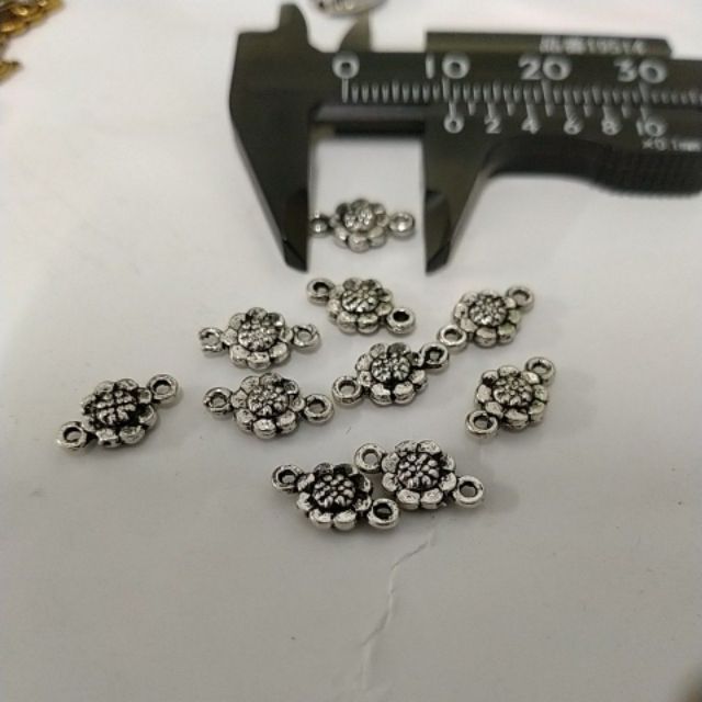 10 Mặt hoa 2 lỗ treo nhỏ 6x10mm