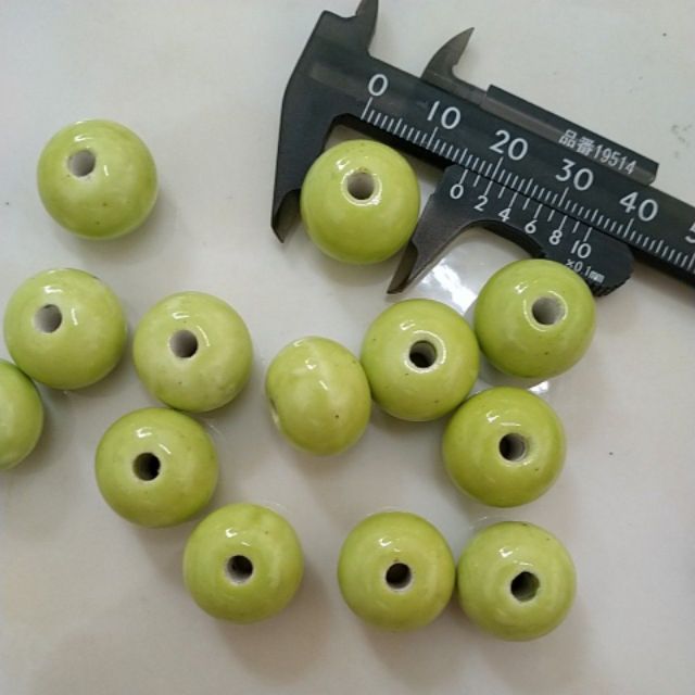 5viên gốm sứ hình cầu dẹp 15mm