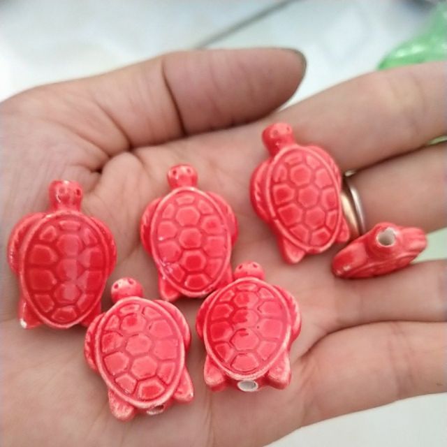 2 con rùa gốm sứ màu đỏ cam 19x27mm