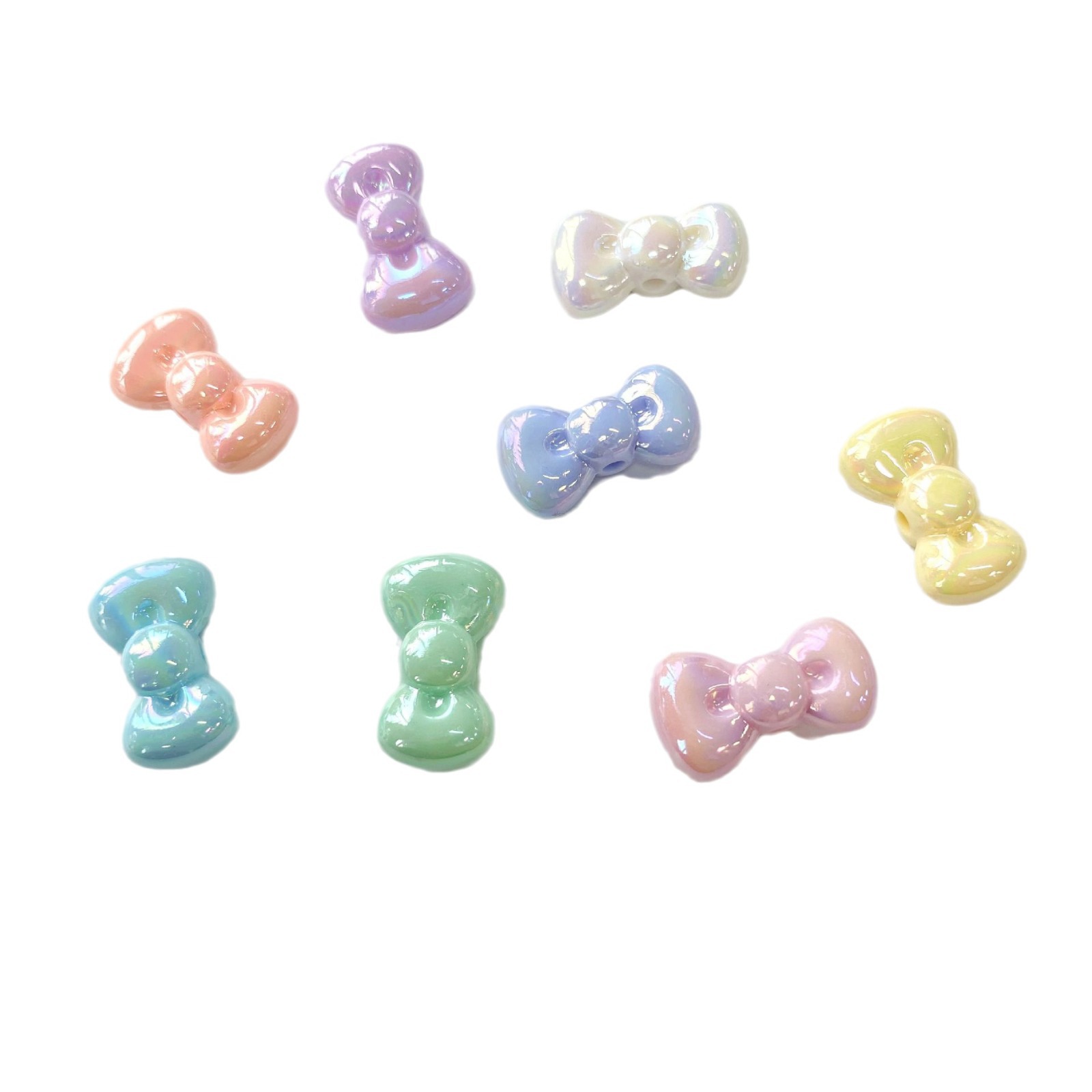 50-500gam Nơ 16x27mm dễ thương ,hạt charm holo  bóng đẹp có lỗ xỏ dọc
