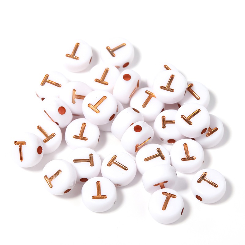 (chọn chữ) 50- 100 chữ nền trắng chữ vàng gold 4x7mm CÓ LỖ XỎ làm vòng hạt