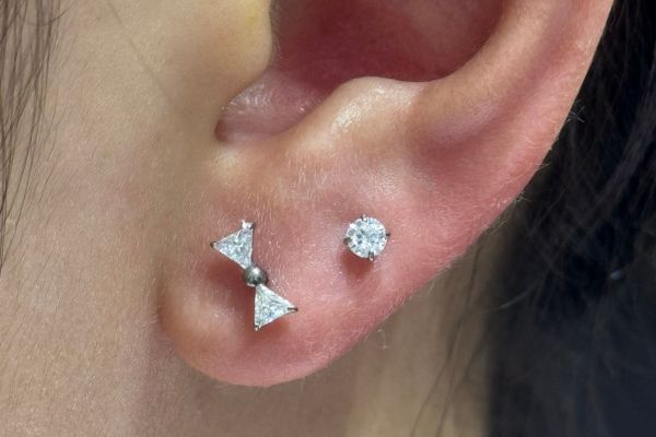 Uống thuốc giảm đau trước khi xỏ khuyên được không?