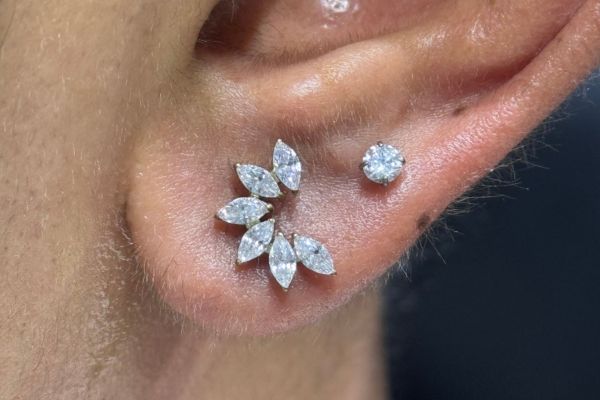 Uống thuốc giảm đau trước khi xỏ khuyên được không?