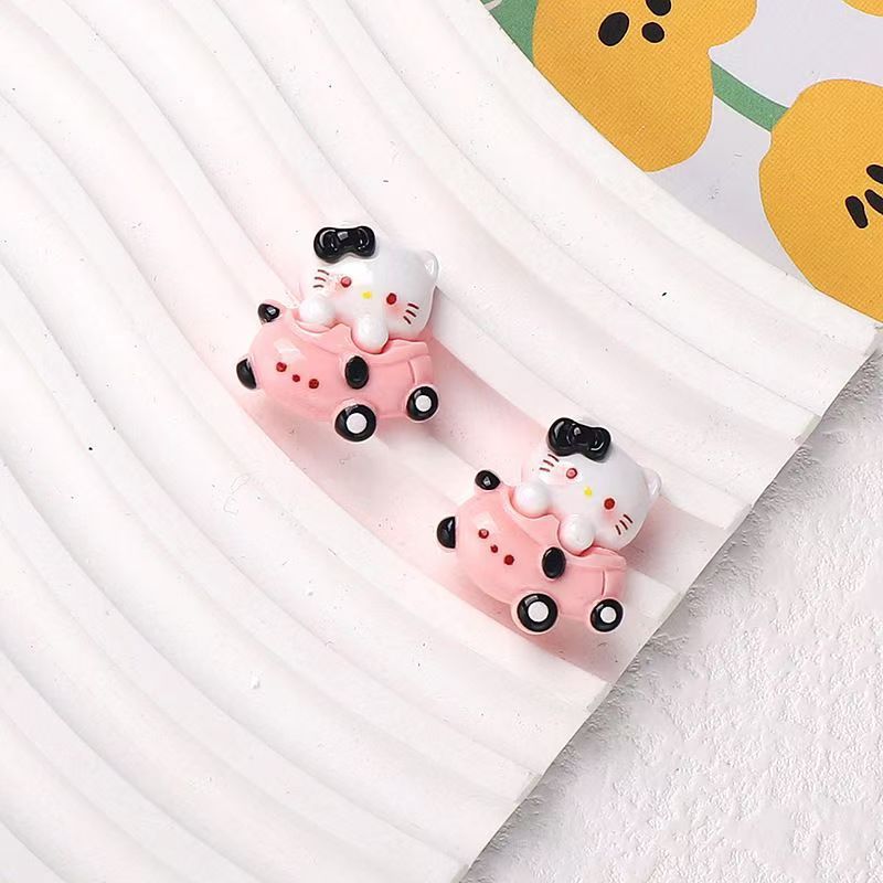 100 CHARM KITTY ĐEN HỒNG