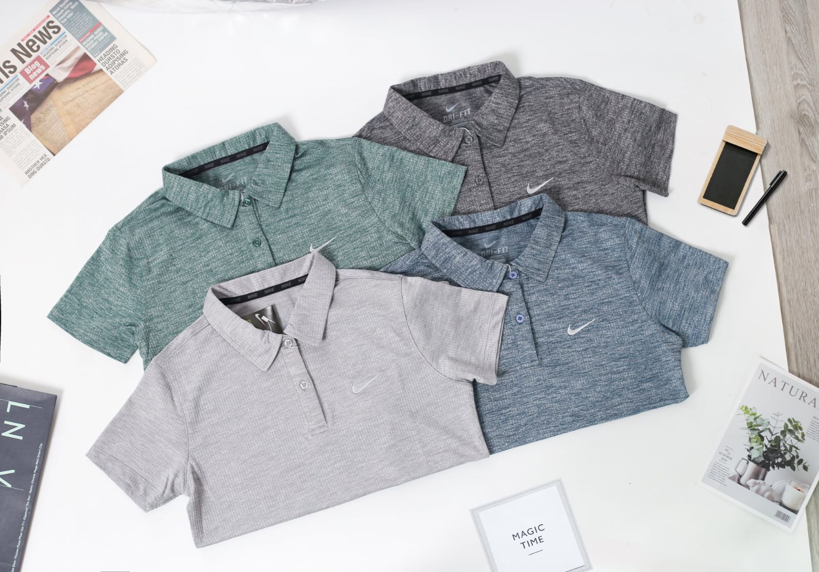 ເສື້ອມີຄໍຍິງມີກະດຸມ NIKE