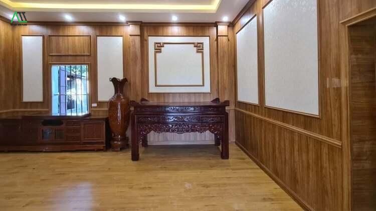 thi công tấm ốp tường giả gỗ