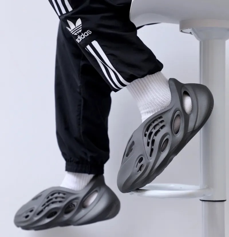 adidas foam runner on feet