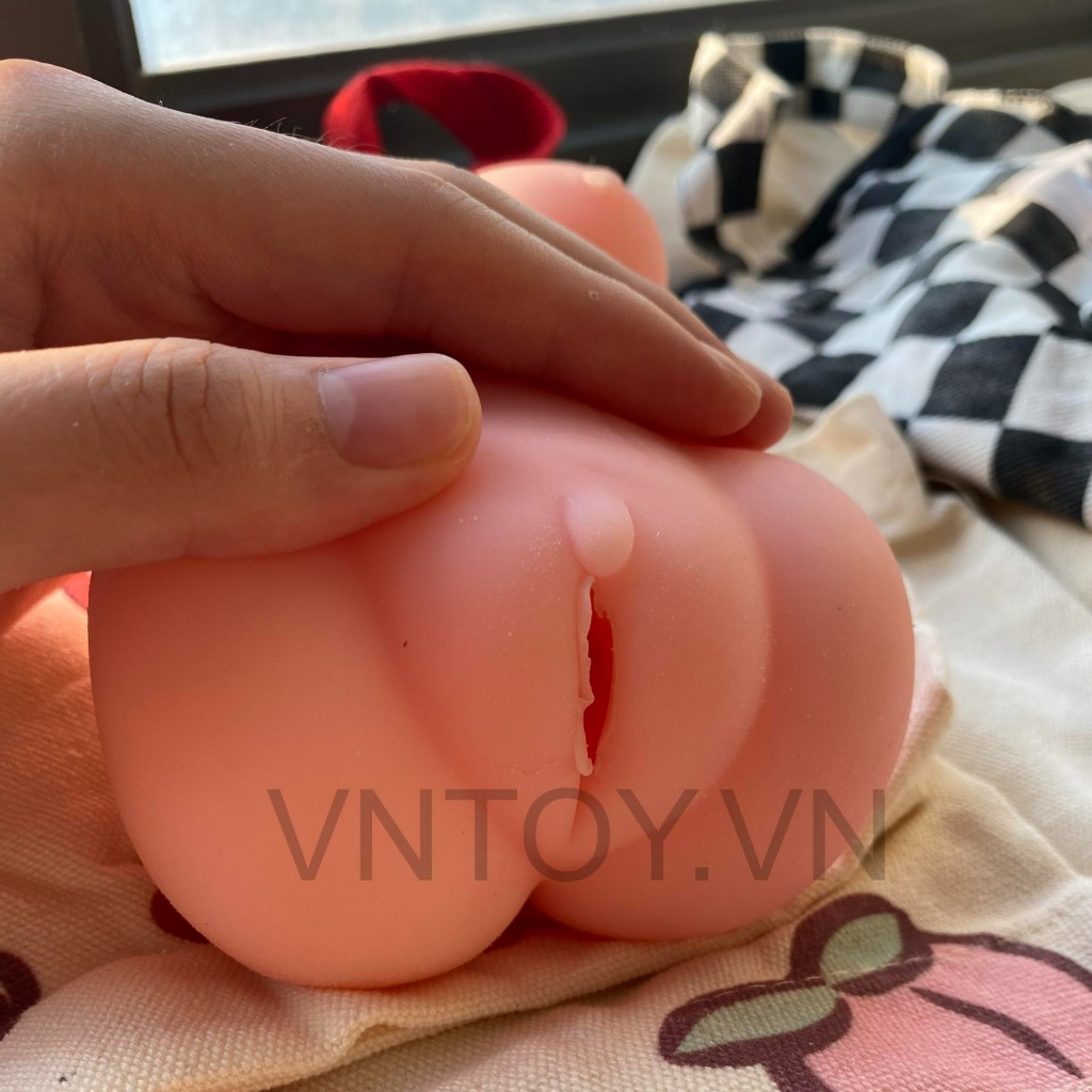 Âm đạo giả cầm tay có vú