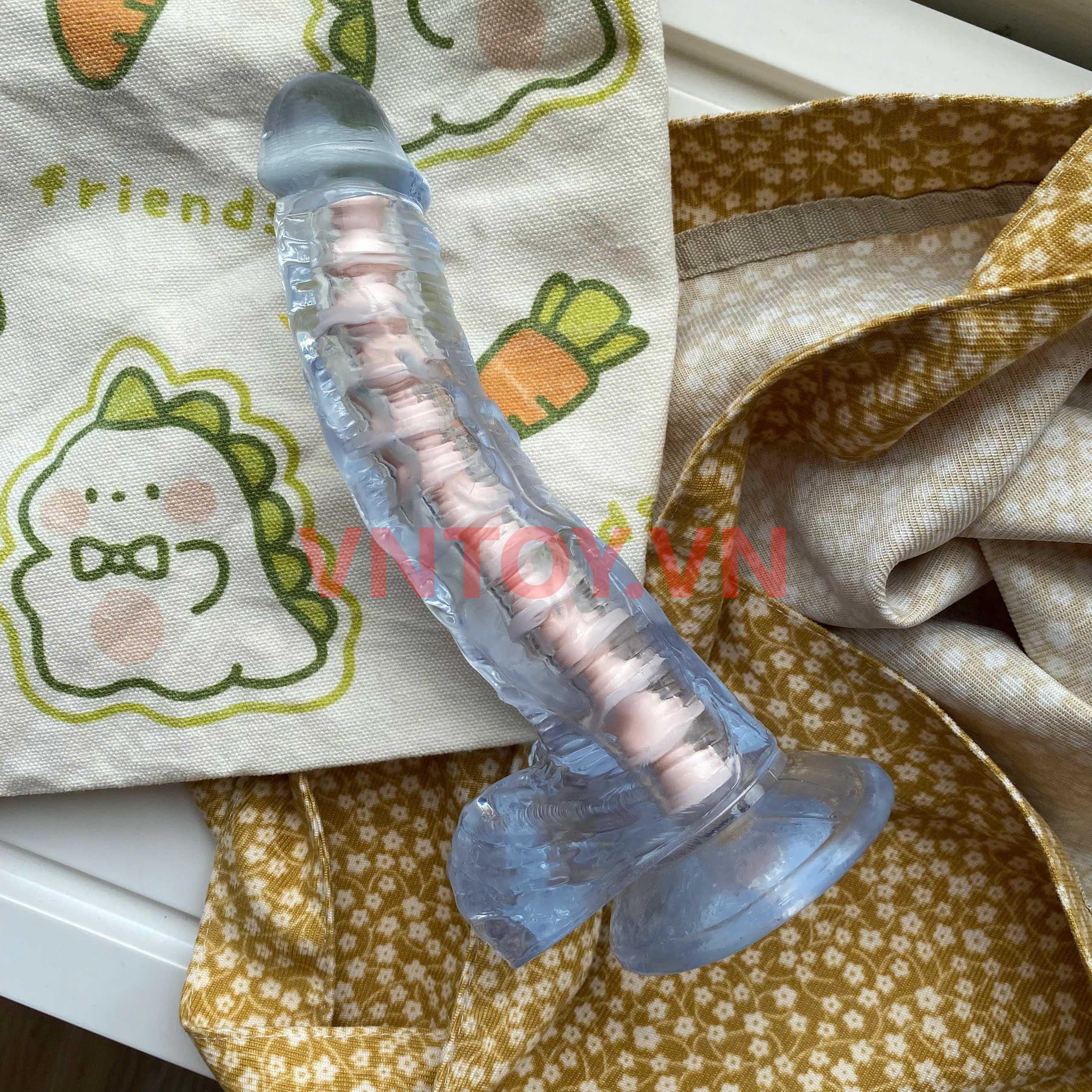 Dương vật giả dẻo trong suốt có lõi xương sống định hình