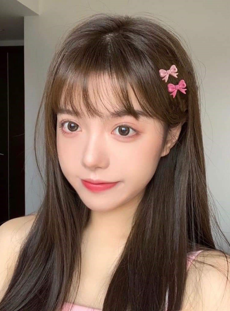 Kẹp tóc mái nơ hồng cute