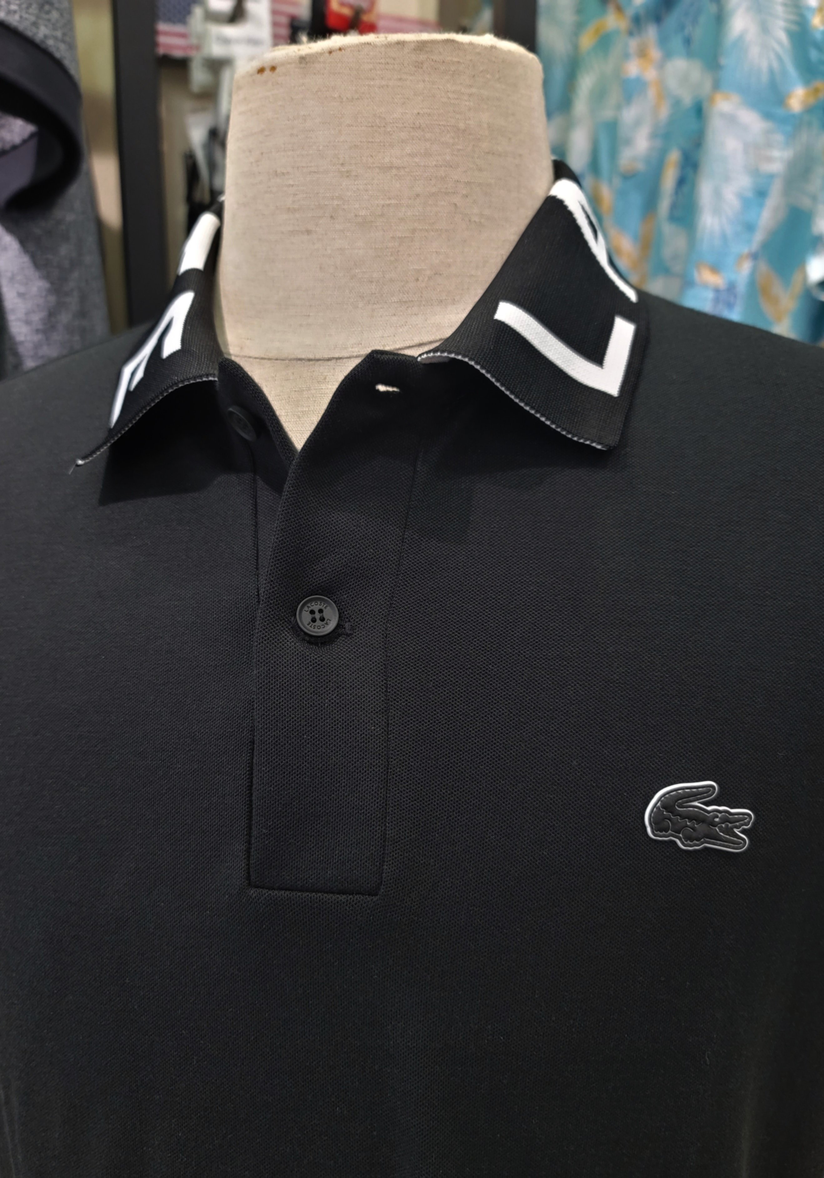 Polo Lacoste Slimfit đen cổ chữ