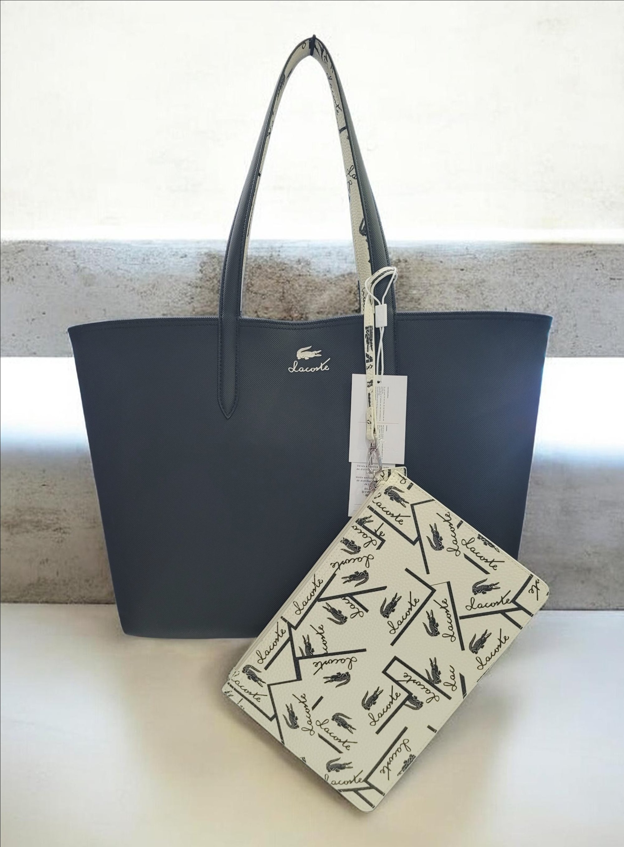 Túi nữ Lacoste 2 mặt đen - trắng
