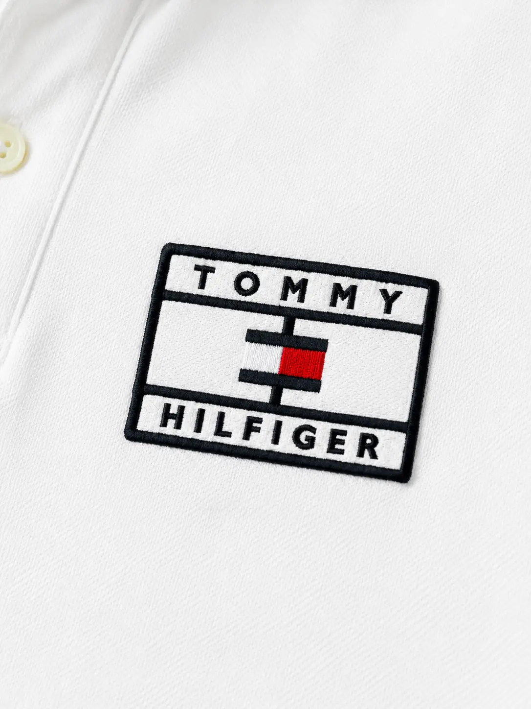 Polo tommy trắng logo ngực vuông