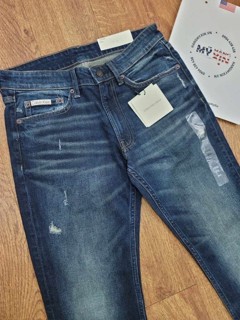 Jeans CK xanh rách