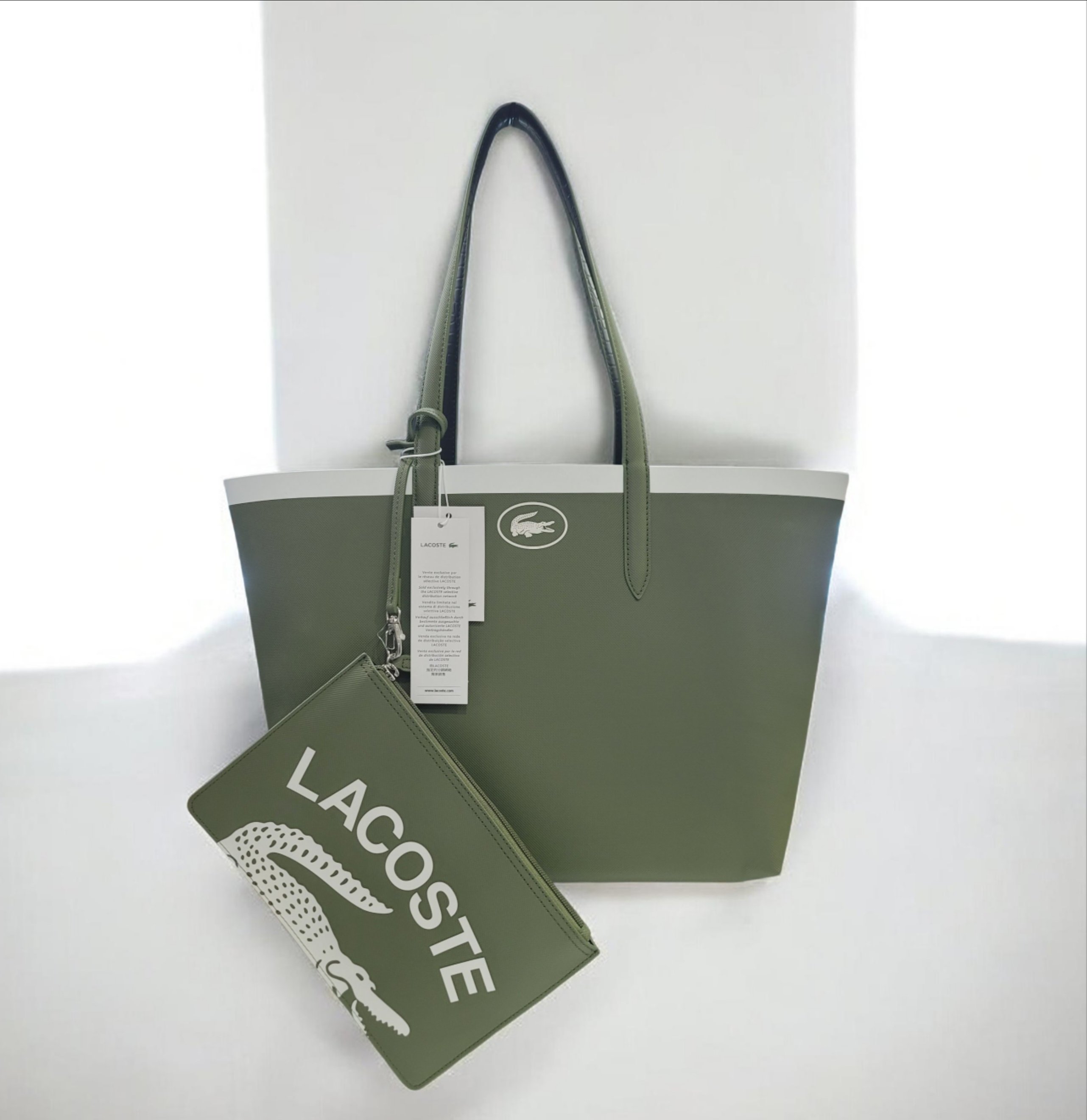Túi nữ Lacoste 2 mặt xanh - đen