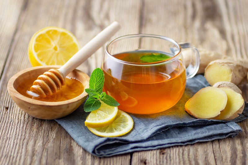 Uống nước chanh nóng mật ong buổi sáng có tác dụng gì?