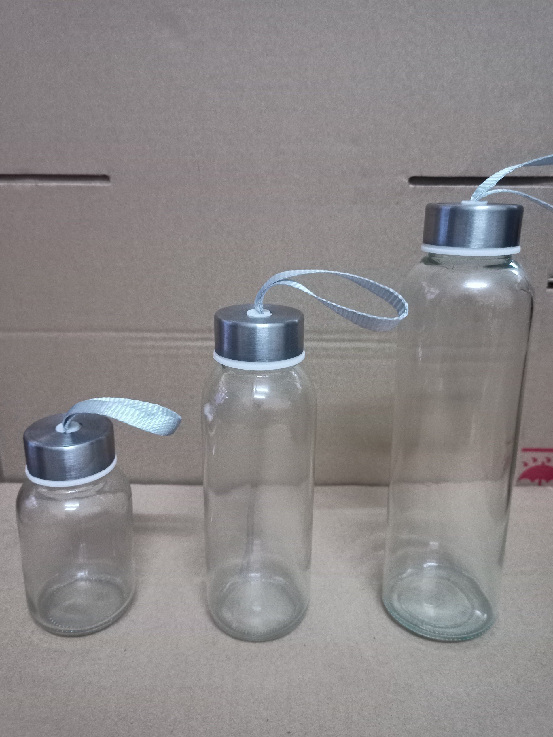 Chai Thủy Tinh 150ml 300ml 500ml Nắp Nhôm, Nắp Inox Có Dây Xách, Đựng Nước Ép, Sinh Tố, Detox, Nắp Nhựa Bọc Kim Loại Chắc Chắn - North Star Packing