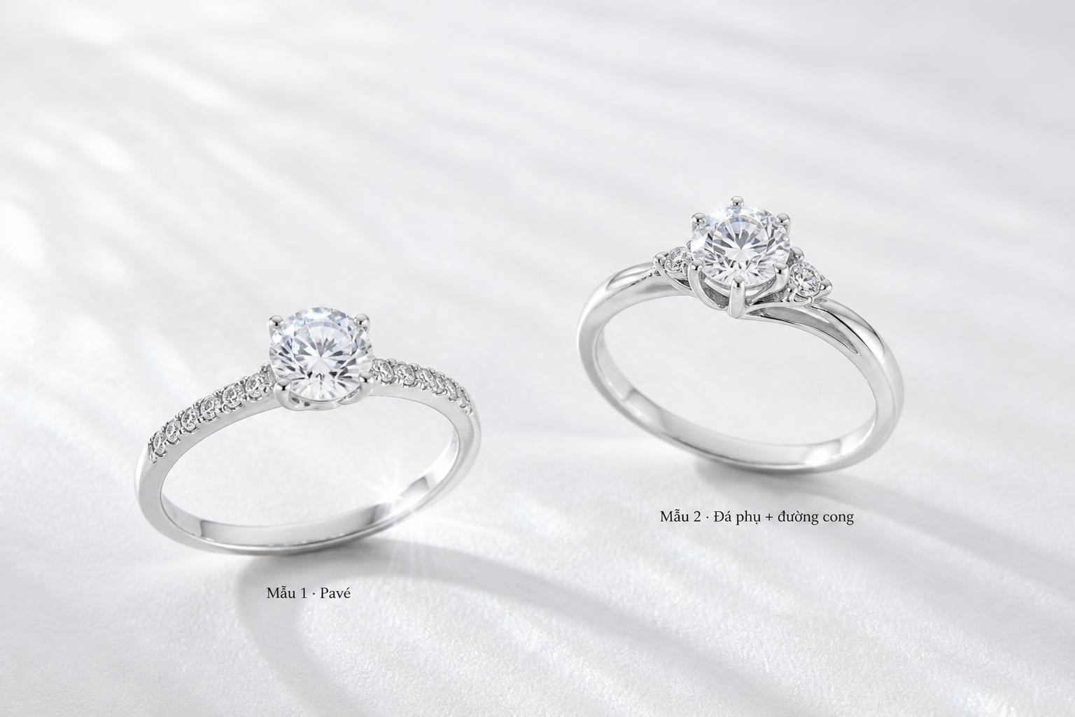 NVCH001 với hai cách tạo điểm sáng quanh đá chủ: Pavé ở Mẫu 1 và đá phụ kết hợp đường cong ở Mẫu 2