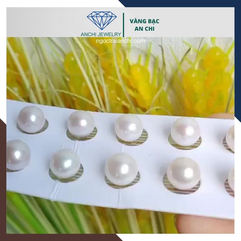 Viên ngọc trai thật nuôi nước ngọt 10-11mm màu trắng, không lỗ, tròn xoe, độ bóng 5A, không vết sinh trưởng.