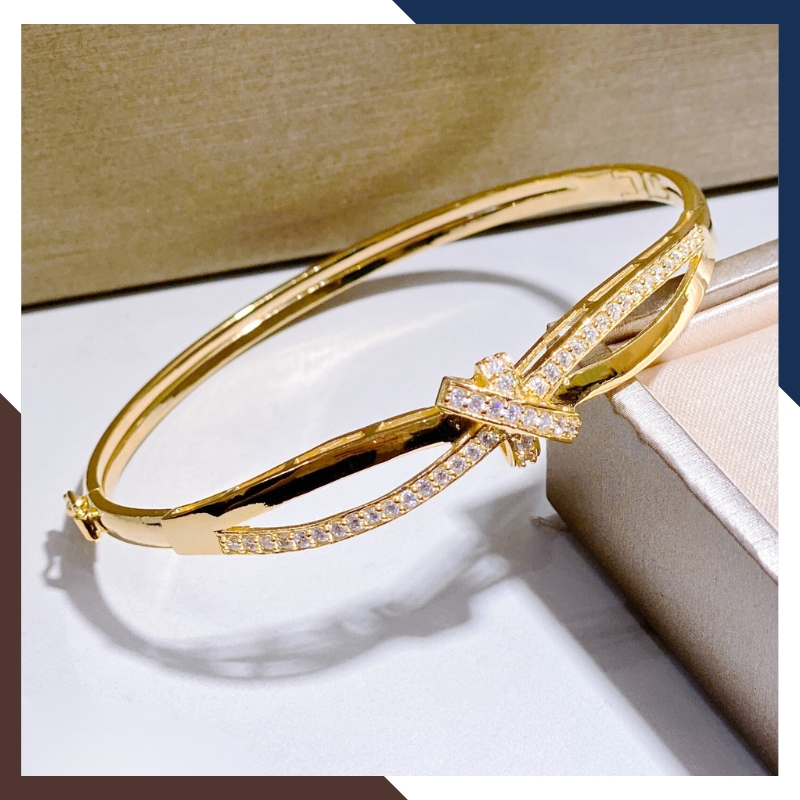 Vòng tay vàng nữ, lắc tay kiềng cứng 1.8 chỉ vàng tây 10k hình nơ đẹp mã TL182