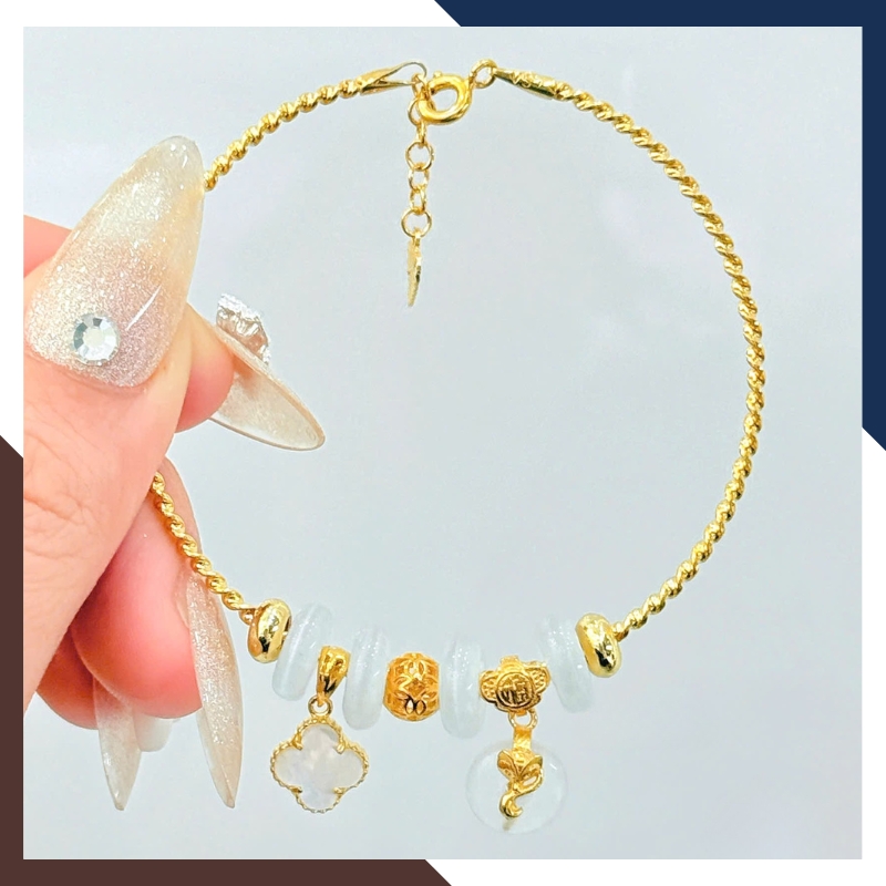 Vòng tay vàng xoắn 10k phối đồng điếu & charm cỏ 4 lá đá mắt mèo tự nhiên LTVN218
