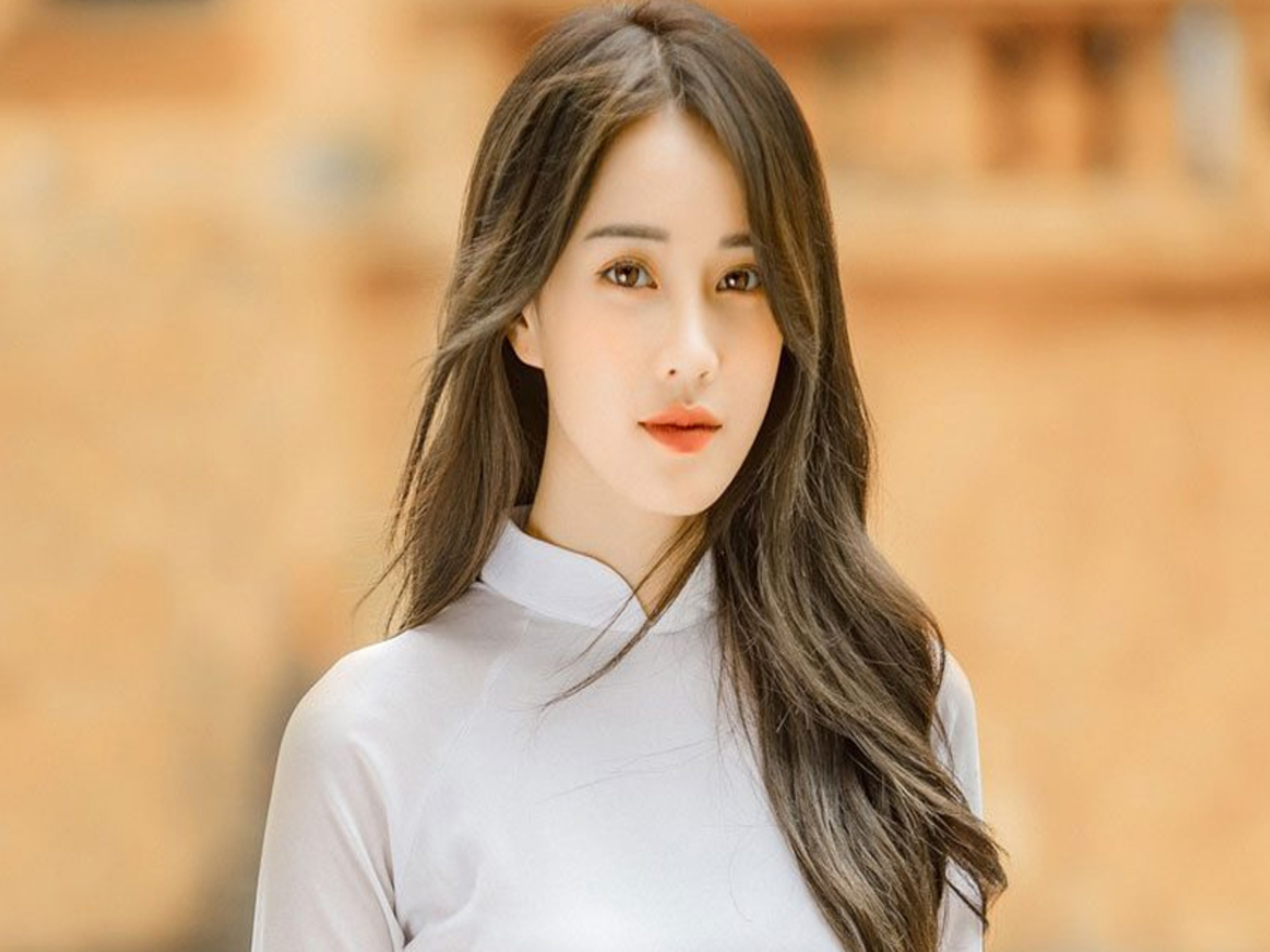 Makeup tone cam đất cho concept áo dài trắng