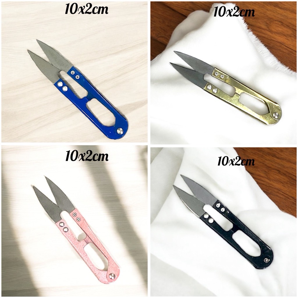 Kéo kim loại cắt chỉ thừa