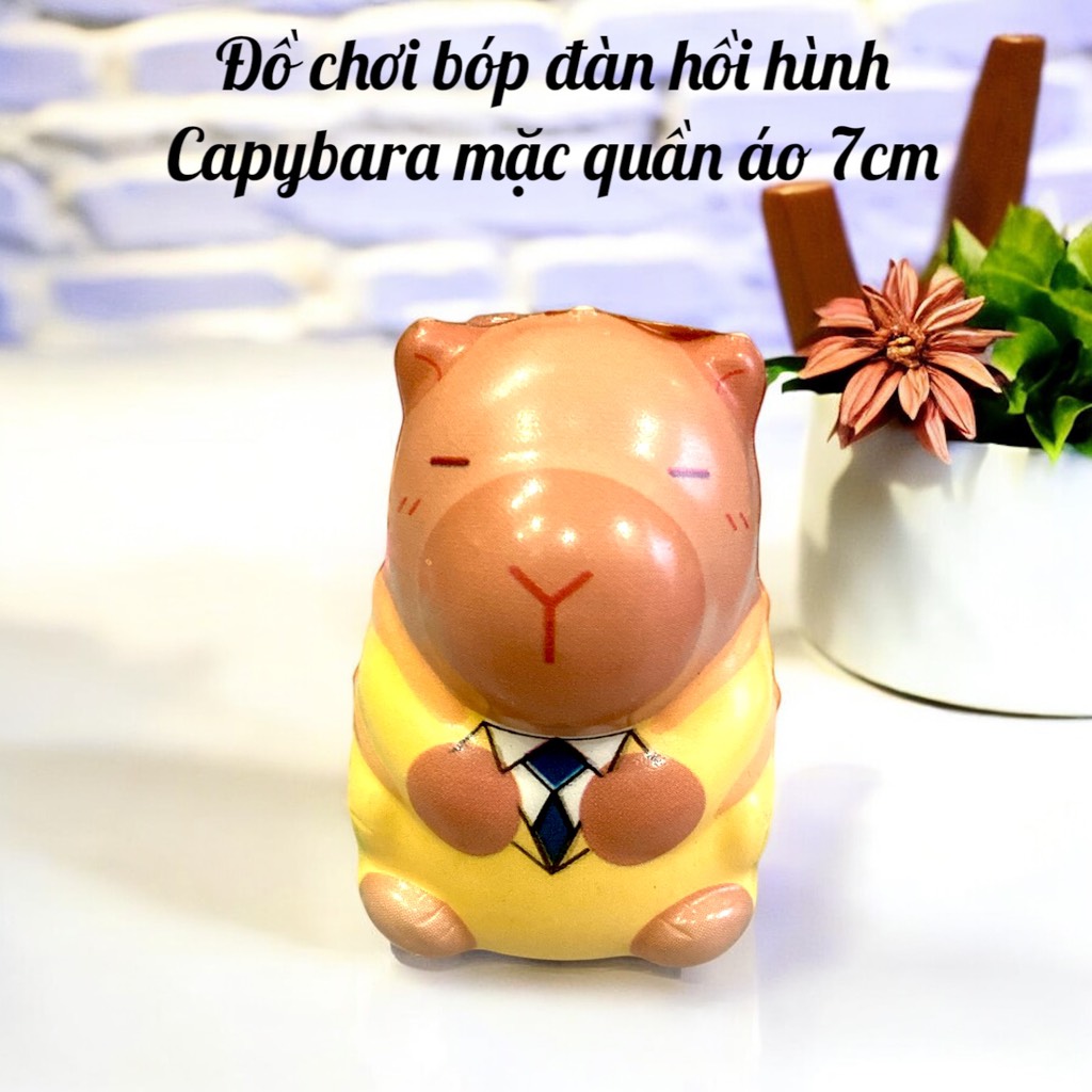 Đồ chơii b.óp đàn hồi hình Capyybara mặc quần áo 7cm