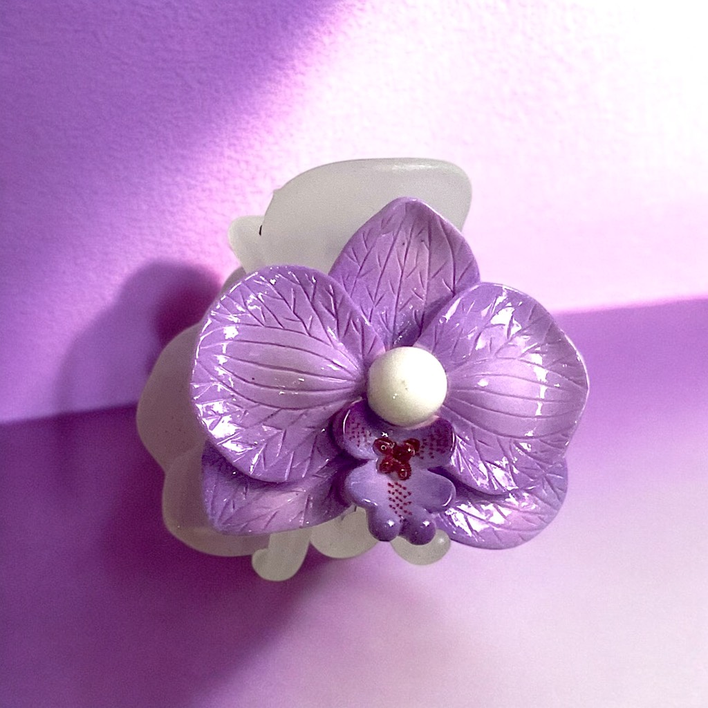 15.2 Kẹp tóc hoa lan (chất liệu: kẹp nhựa, hoa sứ)