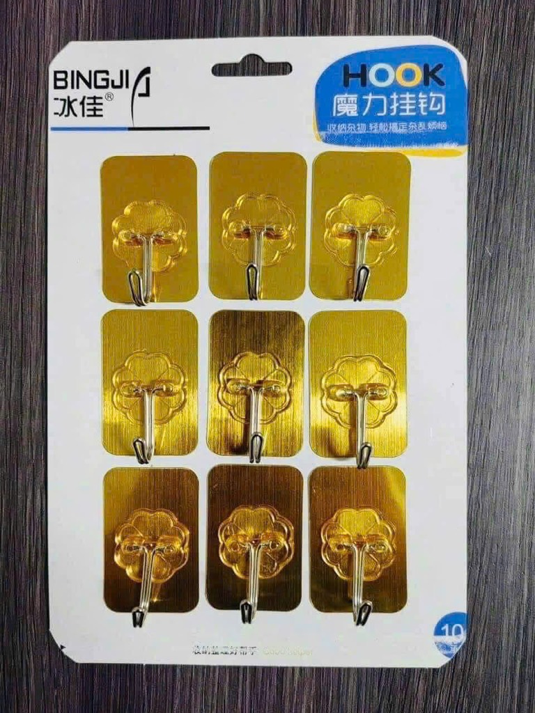 CT1. Vỉ 9 móc dán tường