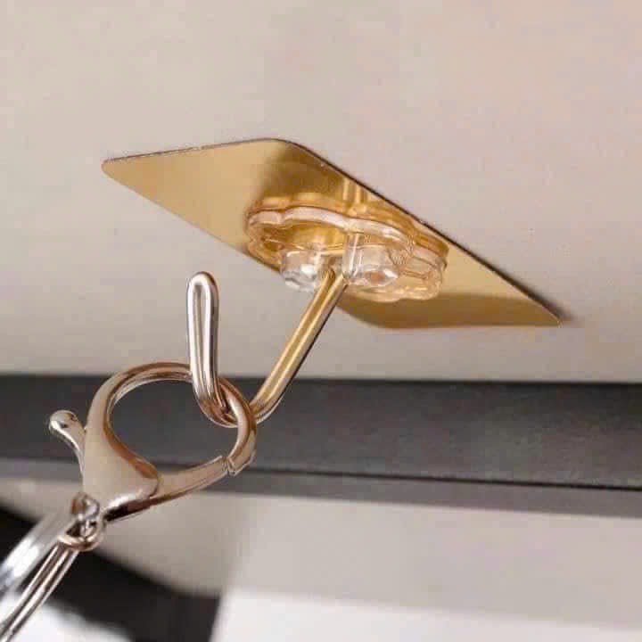 CT1. Vỉ 9 móc dán tường