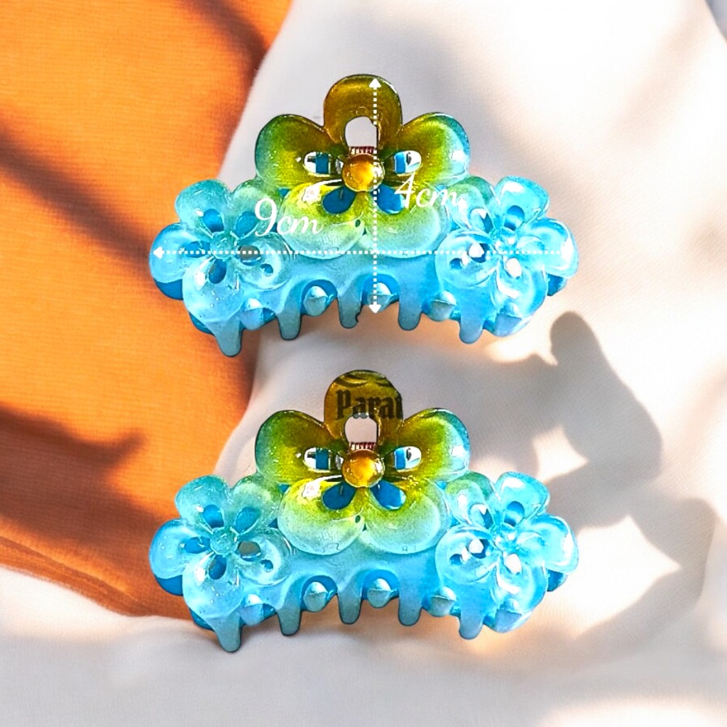 T5.Kẹp tóc hoa mai