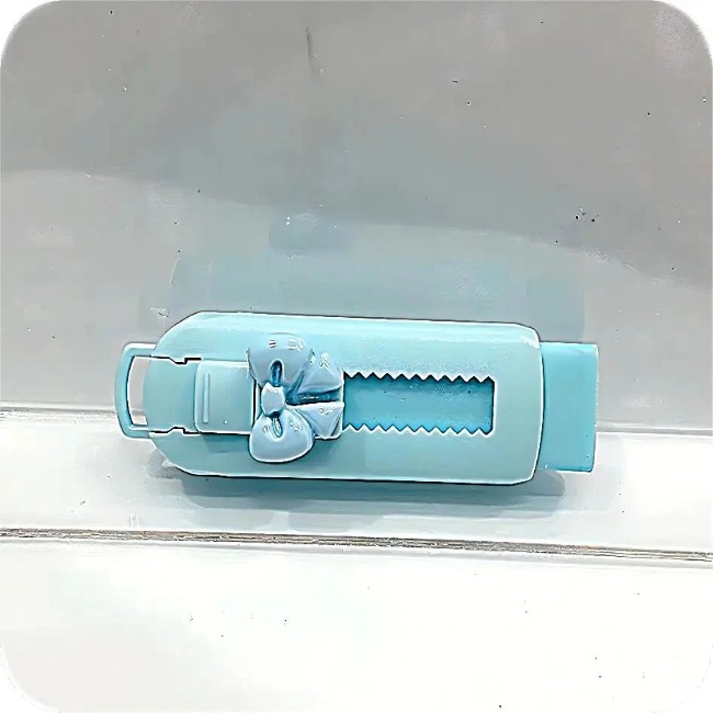 Bút tẩy có thể kéo đẩy gắn charm nơ