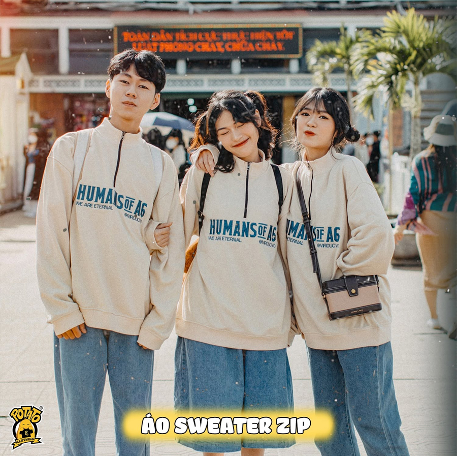Mẫu áo lớp sweater màu kem