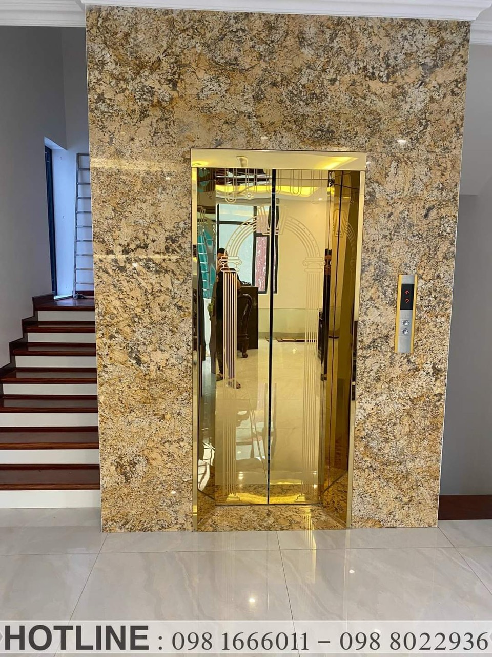 Thang Máy Khung Thép Vách Kính Inox Gương Trắng