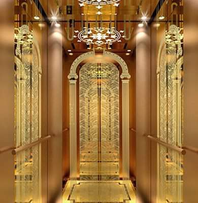 Thang Máy Khung Thép Vách Kính Inox Gương Trắng