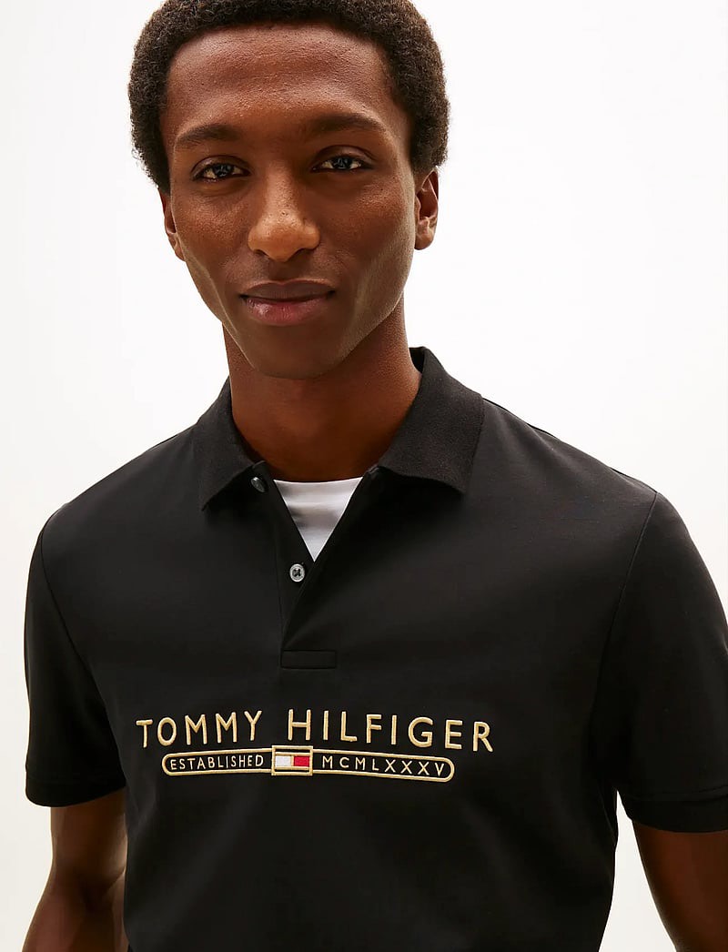 Áo Polo Tommy Hilfiger Regular Fit Embroidered Logo Interlock Black MW41615 001