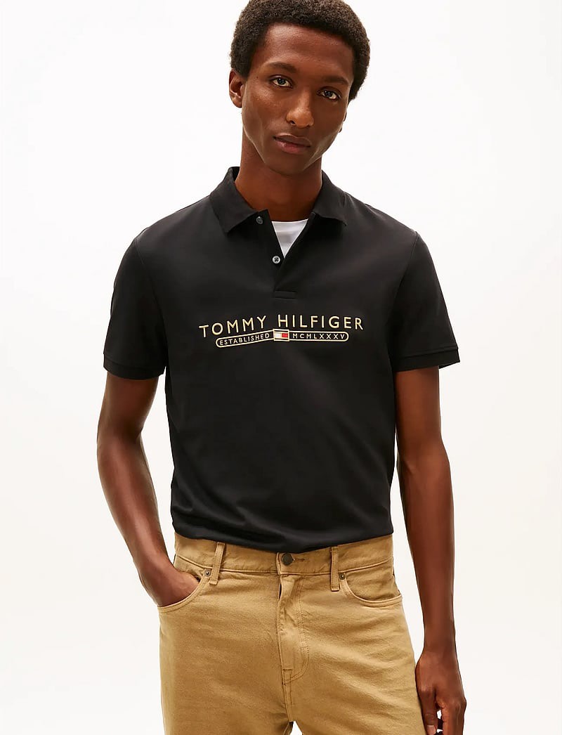 Áo Polo Tommy Hilfiger Regular Fit Embroidered Logo Interlock Black MW41615 001