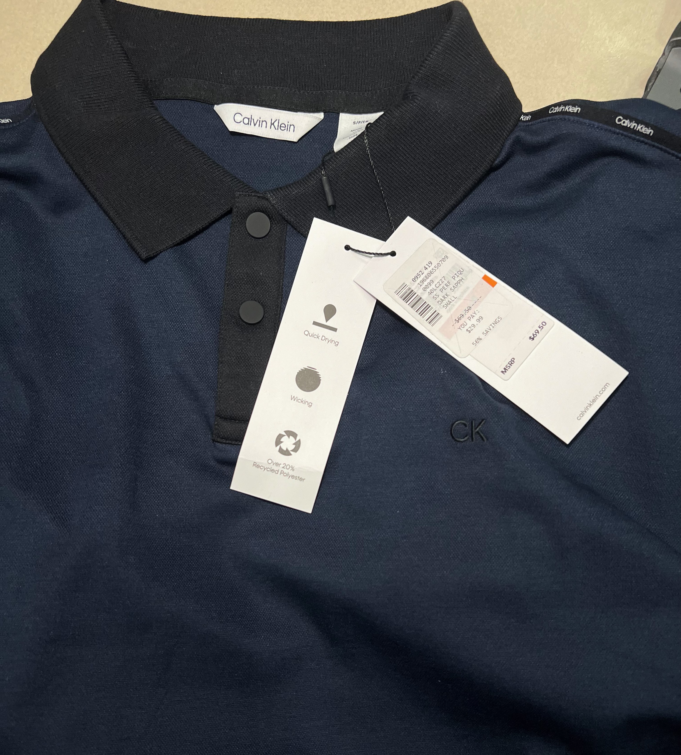 Áo Polo Calvin Klein Quick Drying Dark Sapphire 40LC227