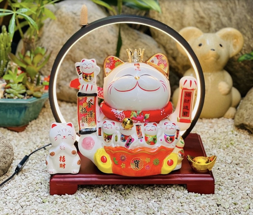 Mèo thần tài: Vũ khí may mắn và sự giàu có bất tận