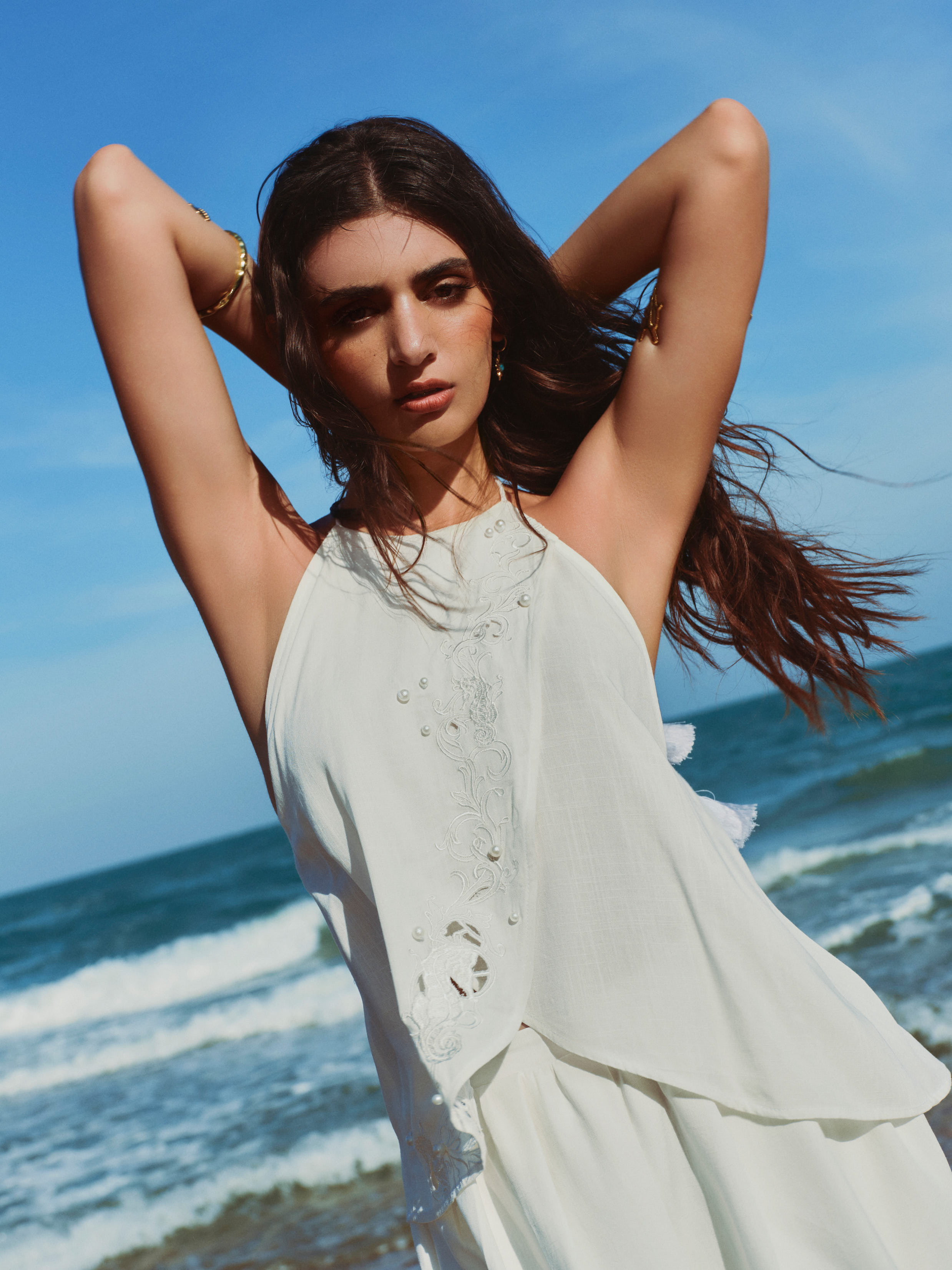 WHITE HALTER NECK PEARL TOP