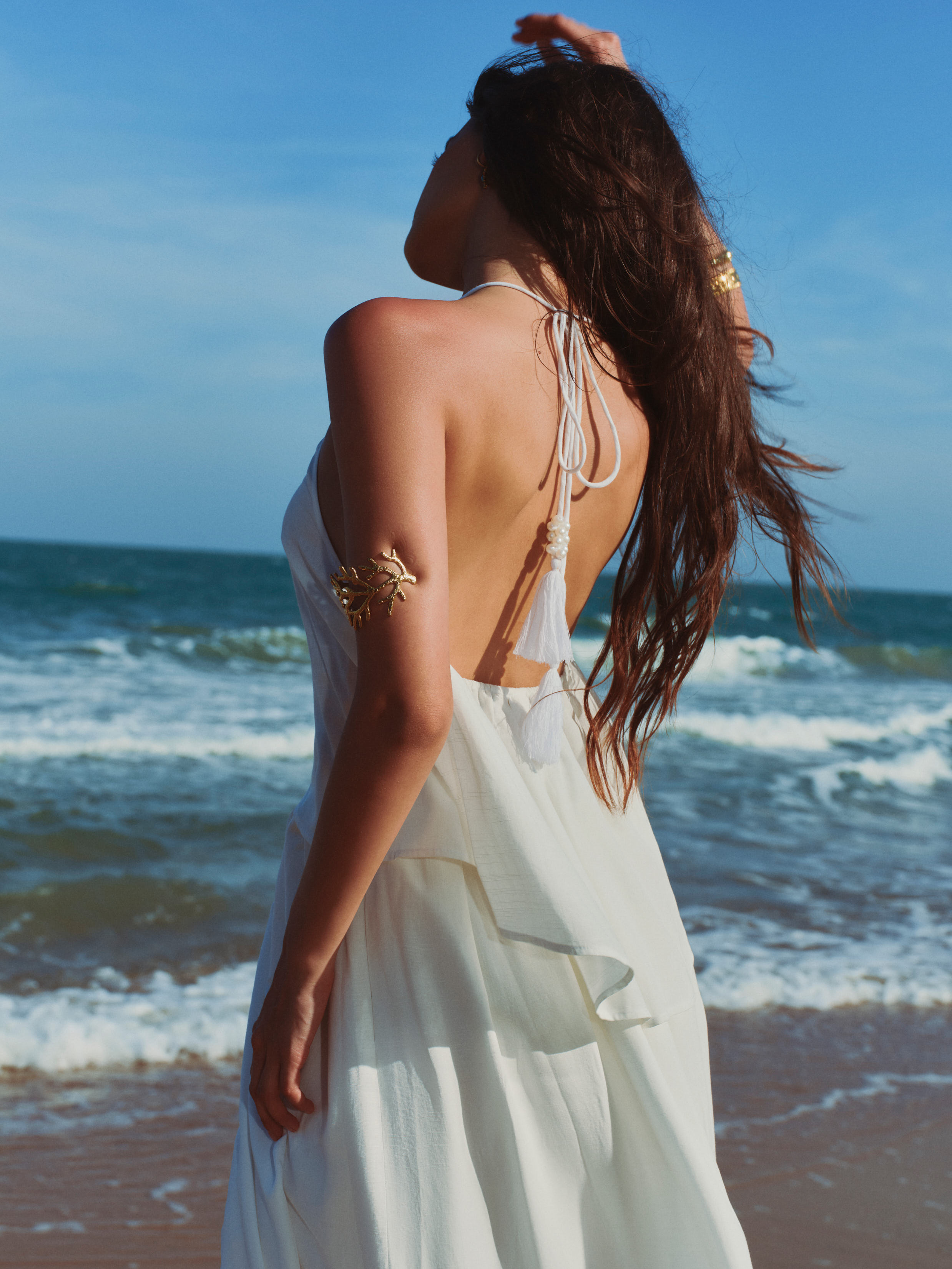 WHITE HALTER NECK PEARL TOP